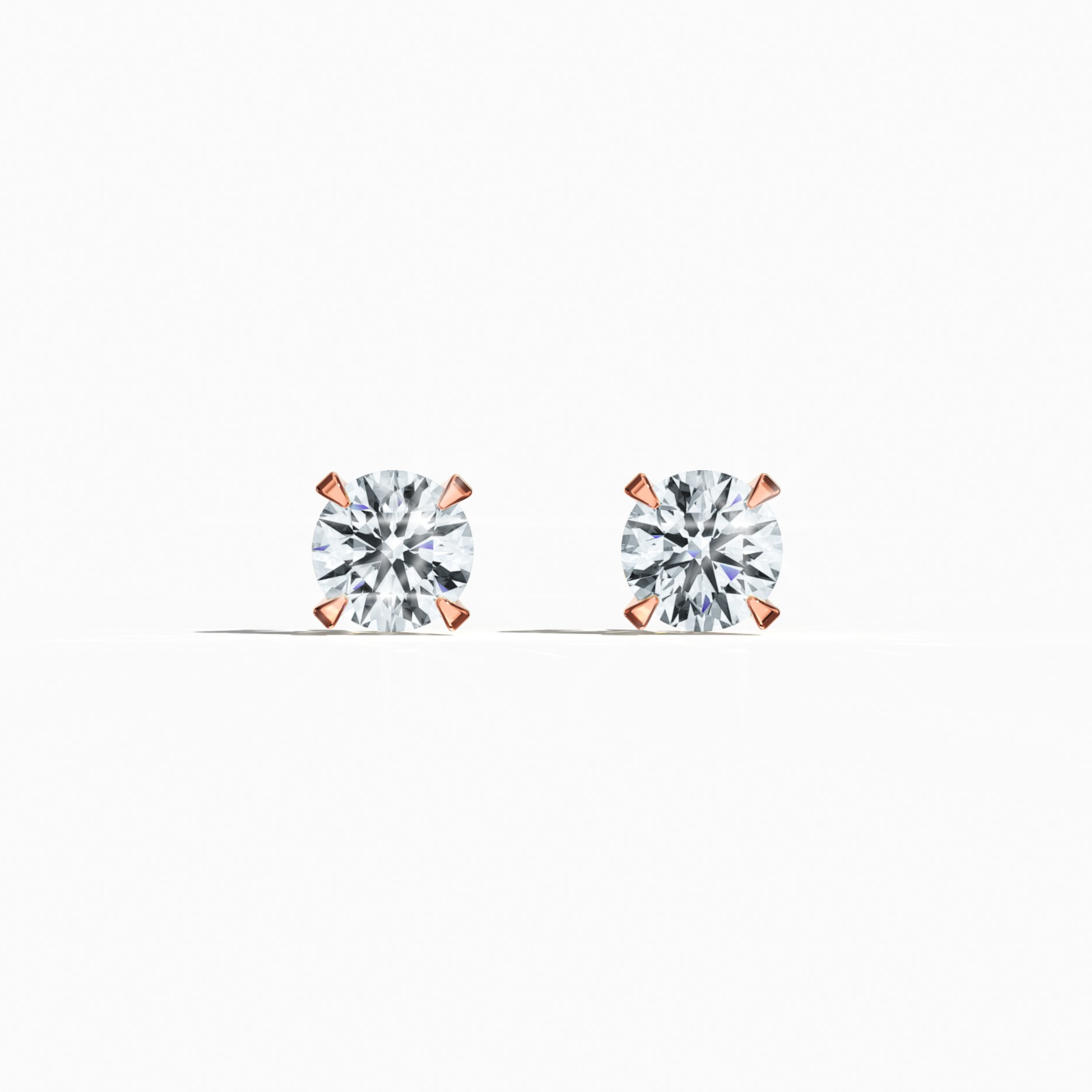 Front view of 1.40 carat natural diamond earring in 18k rose gold with nail prong setting; diamond stud, 1.40ct solitaire diamond, luxury fine jewelry/fine jewellery ear accessory.