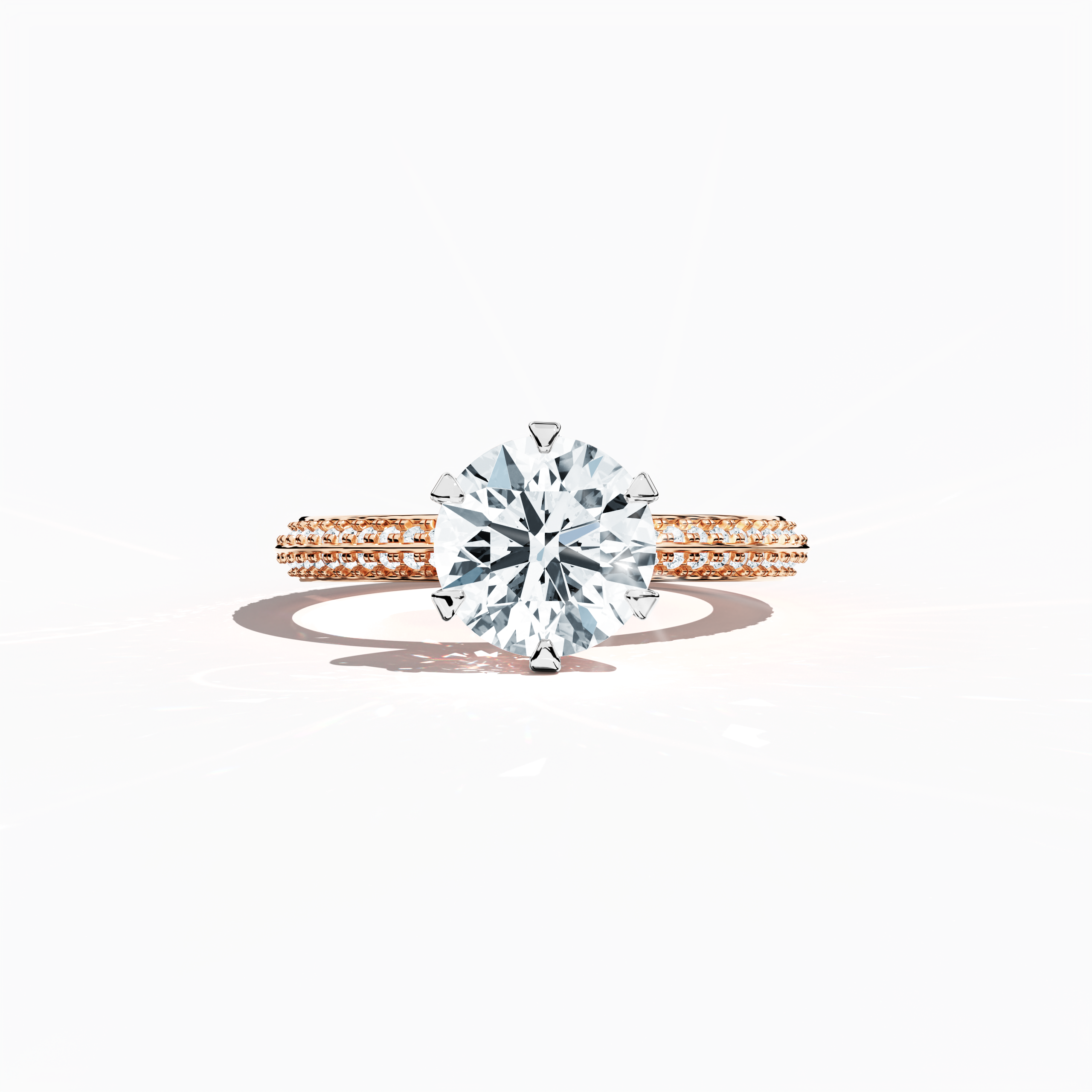 Solitaire paved ring with 2.40 ct total diamonds—featuring a 2 ct center diamond and 0.40 ct pavé side stones—set in a soft rose gold band with a modern two‑step design and a sharp central line. Shown in a sleeping front view on a flat surface, this fine jewelry/fine jewellery ring radiates a warm, romantic glow and refined elegance.