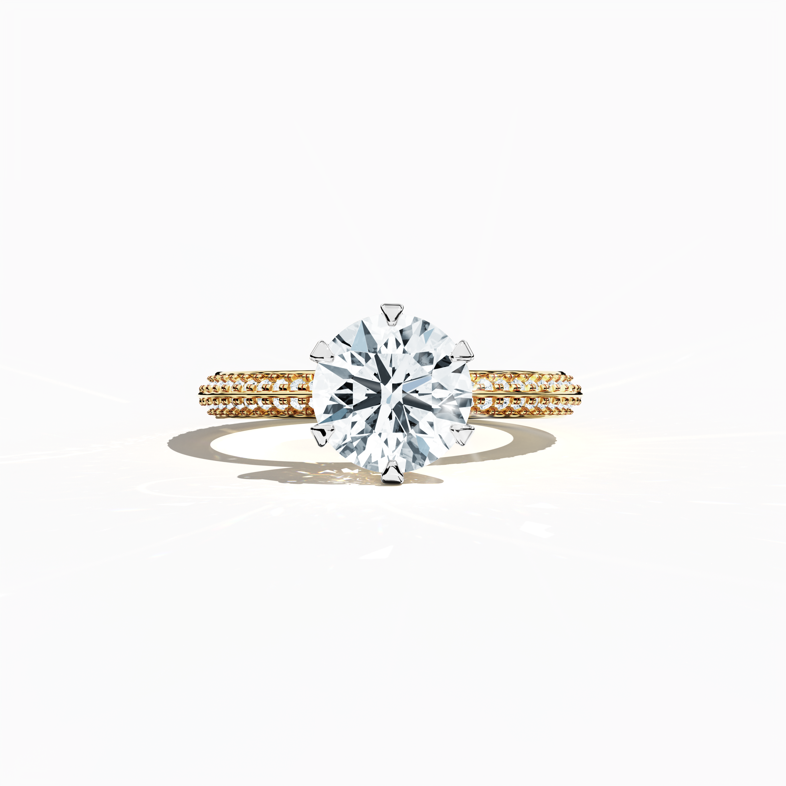 Solitaire paved ring with a total of 2.40 ct diamonds—featuring a 2 ct center diamond and 0.40 ct pavé side stones—set in a rich yellow gold band with a modern two‑step design and a sharp central line. Shown in a sleeping front view, this fine jewelry/fine jewellery ring exudes warm, classic brilliance and refined sparkle.