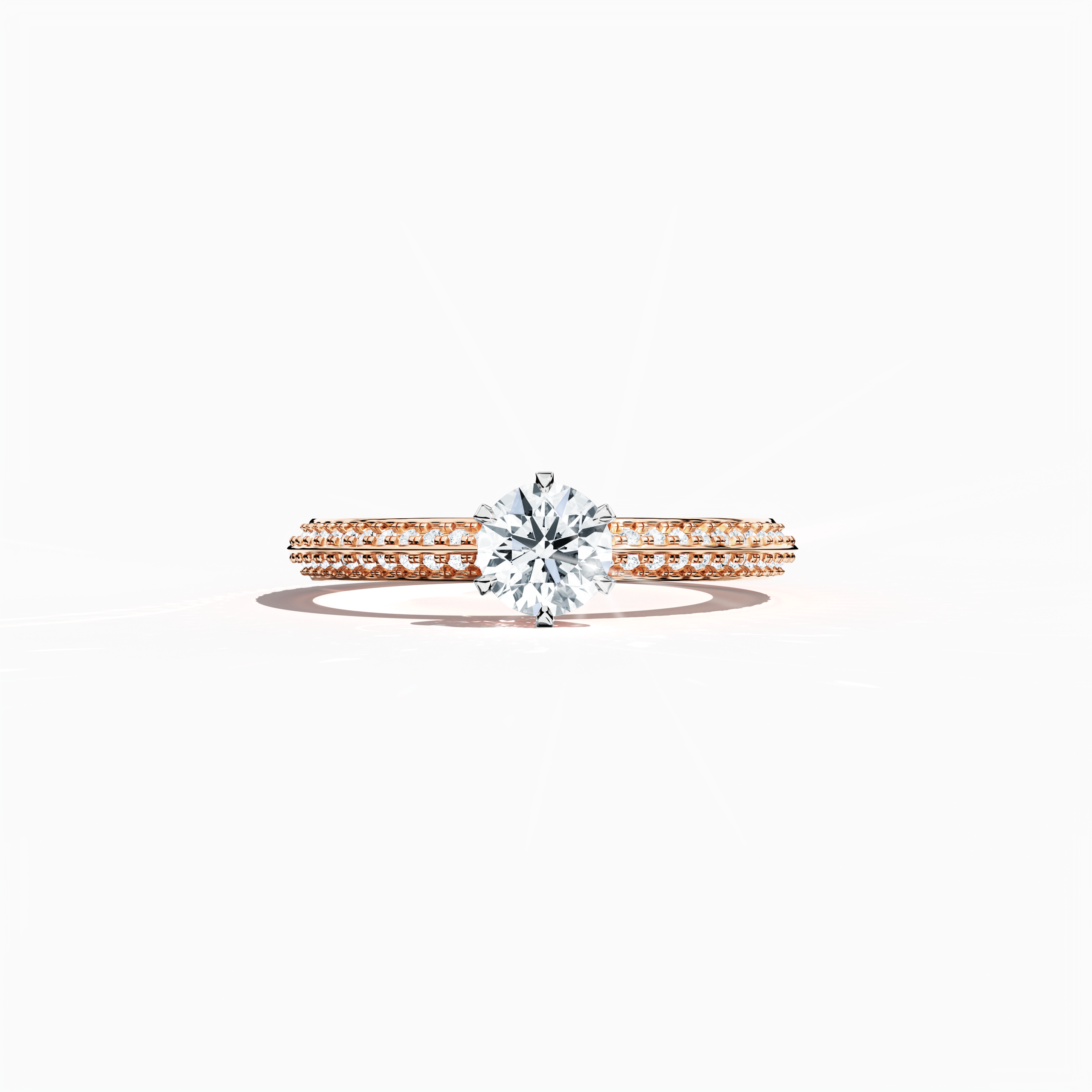 Solitaire paved ring with 0.90 ct total diamonds – featuring a 0.50 ct center diamond and 0.40 ct pavé side stones – set in a soft rose gold band with a modern two‑step band design and a sharp central line. Shown in a sleeping front view on a flat surface, this fine jewelry/fine jewellery ring exudes a warm, romantic glow and refined elegance.