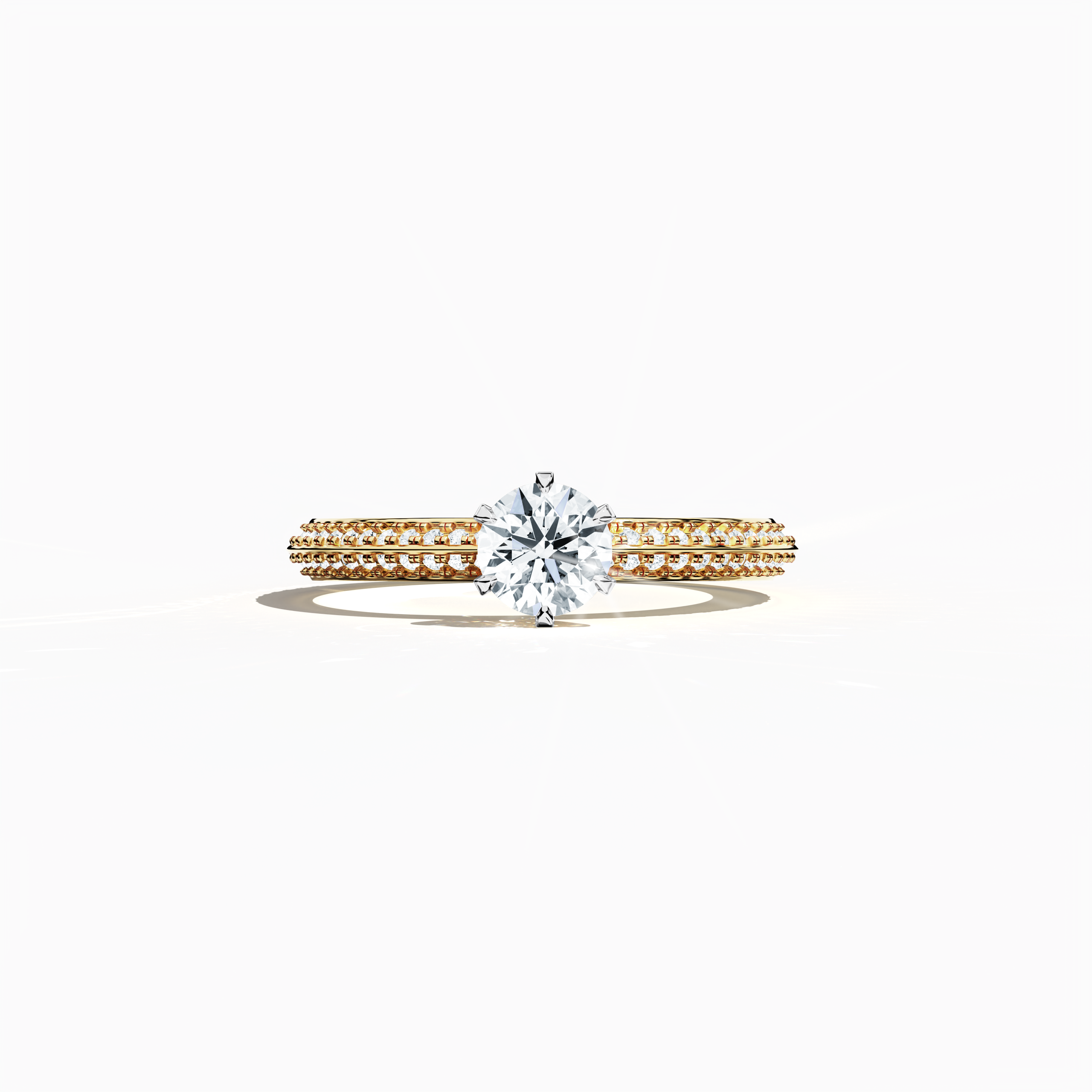Solitaire paved ring with 0.90 ct total diamonds – featuring a 0.50 ct center stone and 0.40 ct pavé side stones – set in a rich yellow gold band with a modern two‑step band design and a sharp central line. Shown in a sleeping front view on a flat surface, this fine jewelry/fine jewellery ring exudes warm, classic brilliance and refined sparkle.
