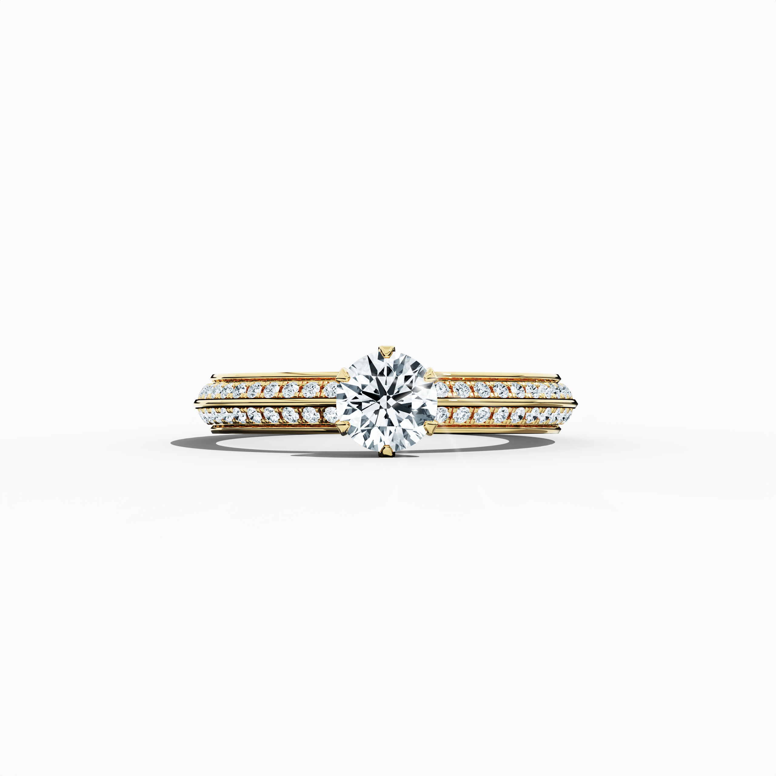 Solitaire paved ring with 0.90 ct total diamonds – featuring a 0.50 ct center stone and 0.40 ct pavé side stones – set in a rich yellow gold band with a modern two‑step band design and a sharp central line. Shown in a sleeping front view on a flat surface, this fine jewelry/fine jewellery ring exudes warm, classic brilliance and refined sparkle.