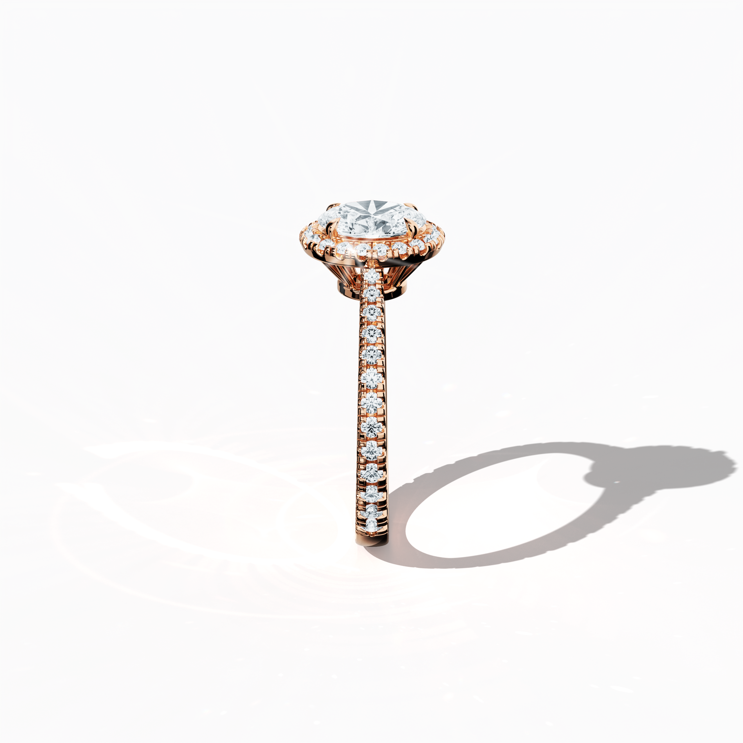 Detailed standing side view of a rose gold halo paved ring, accentuating its elegant profile and curved band featuring a 1ct oval-cut central diamond with a 0.60ct side diamond halo. The lateral perspective reveals delicate pavé details in warm rose, pink, and blush gold that merge classic halo, vintage halo, modern halo, and bridal halo design aesthetics. Keywords: refined craftsmanship, luxury, oval brilliance, modern style, elegant design.