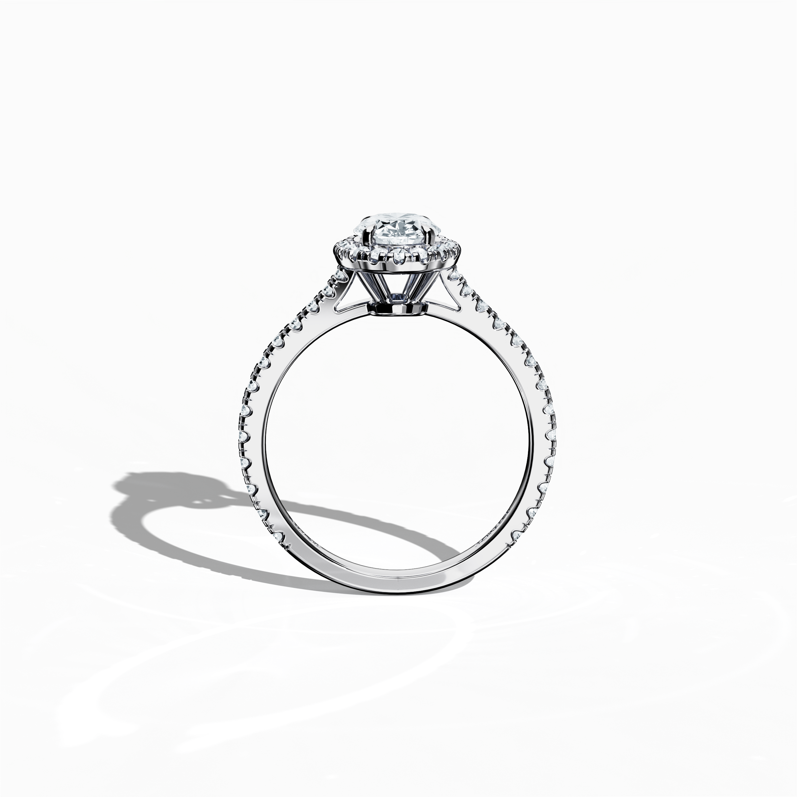 Vivid standing front view of a white gold halo paved ring, emphasizing the brilliant 1ct oval-cut central diamond and its encircling 0.60ct side diamond halo. The sleek band in white, silver, and pale gold showcases meticulous pavé craftsmanship with influences from classic halo, vintage halo, modern halo, and bridal halo designs. Keywords: exquisite, timeless, refined artistry, oval radiance, high-craftsmanship.