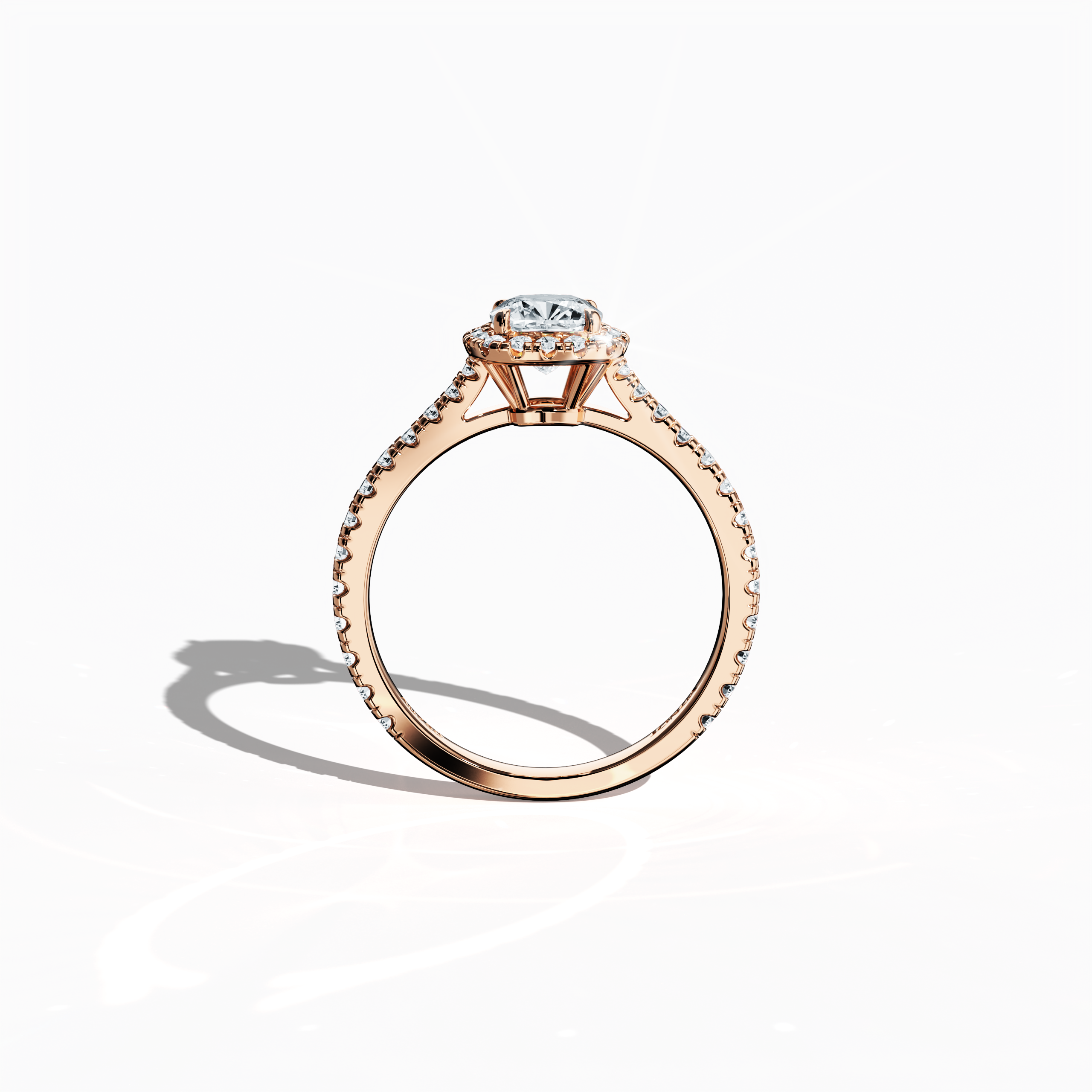 In a bold standing front view, this halo paved diamond ring in lustrous rose gold dazzles with its 1.60 carat display of opulent sparkle. The central 1 ct cushion diamond, framed by a 0.60 ct halo of luminous side stones, reflects Classic Halo, Vintage Halo, and Modern Halo design inspirations with cushion and radiant cut details. Its warm, pink, blush finish exudes sophisticated elegance. Keywords: diamond, luxury, handcrafted, elegance, sparkle.