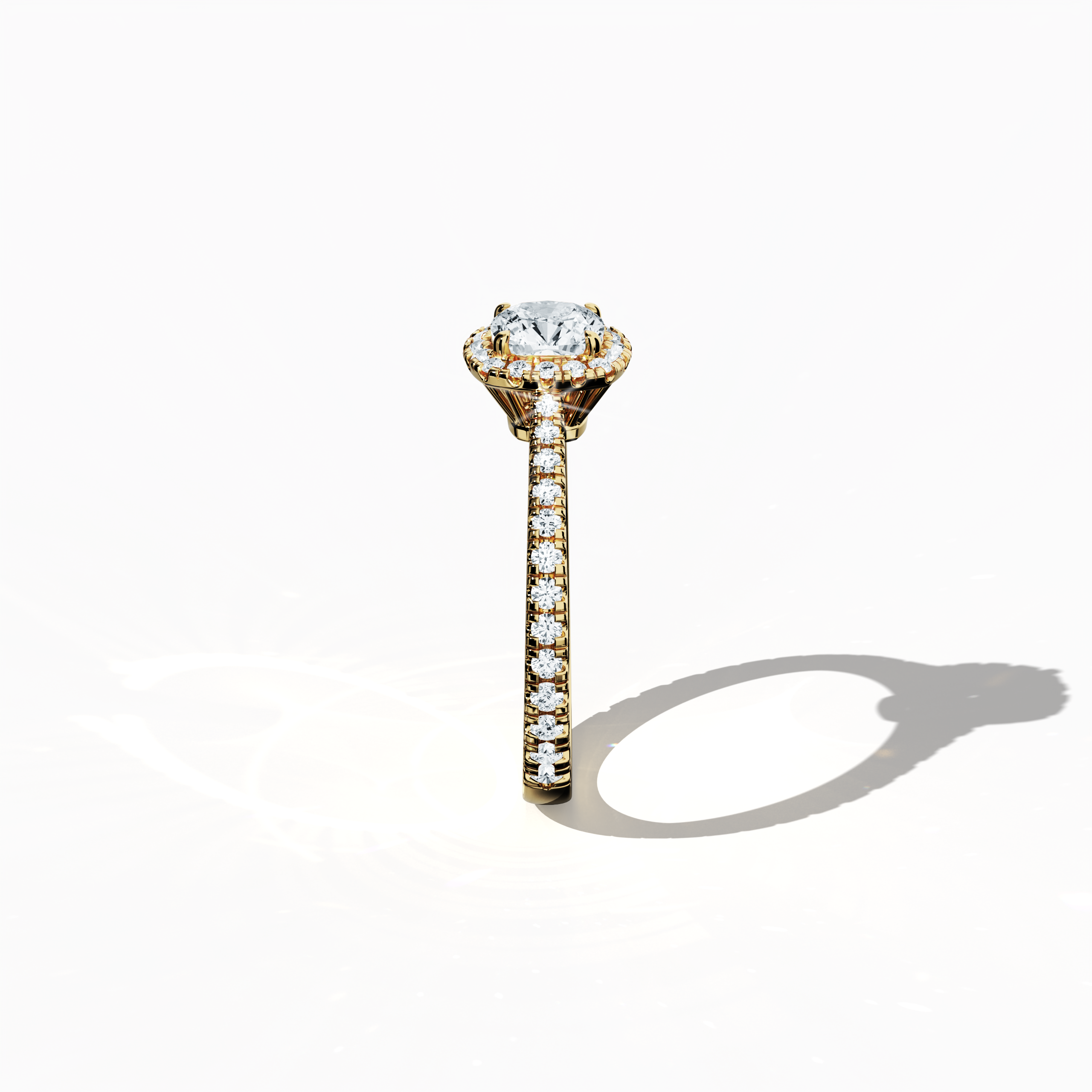 Revealed in a detailed standing side view, the halo paved diamond ring in glowing yellow gold showcases refined artistry and luminous splendor. The 1 ct cushion diamond centerpiece, embraced by a 0.60 ct halo of brilliant side stones for a total of 1.60 carats, marries Classic Halo, Eternity Halo, and Contemporary Halo designs with cushion and princess cut accents, all enhanced by a rich, golden, amber finish. Keywords: diamond, luxury, handcrafted, brilliance, elegance.