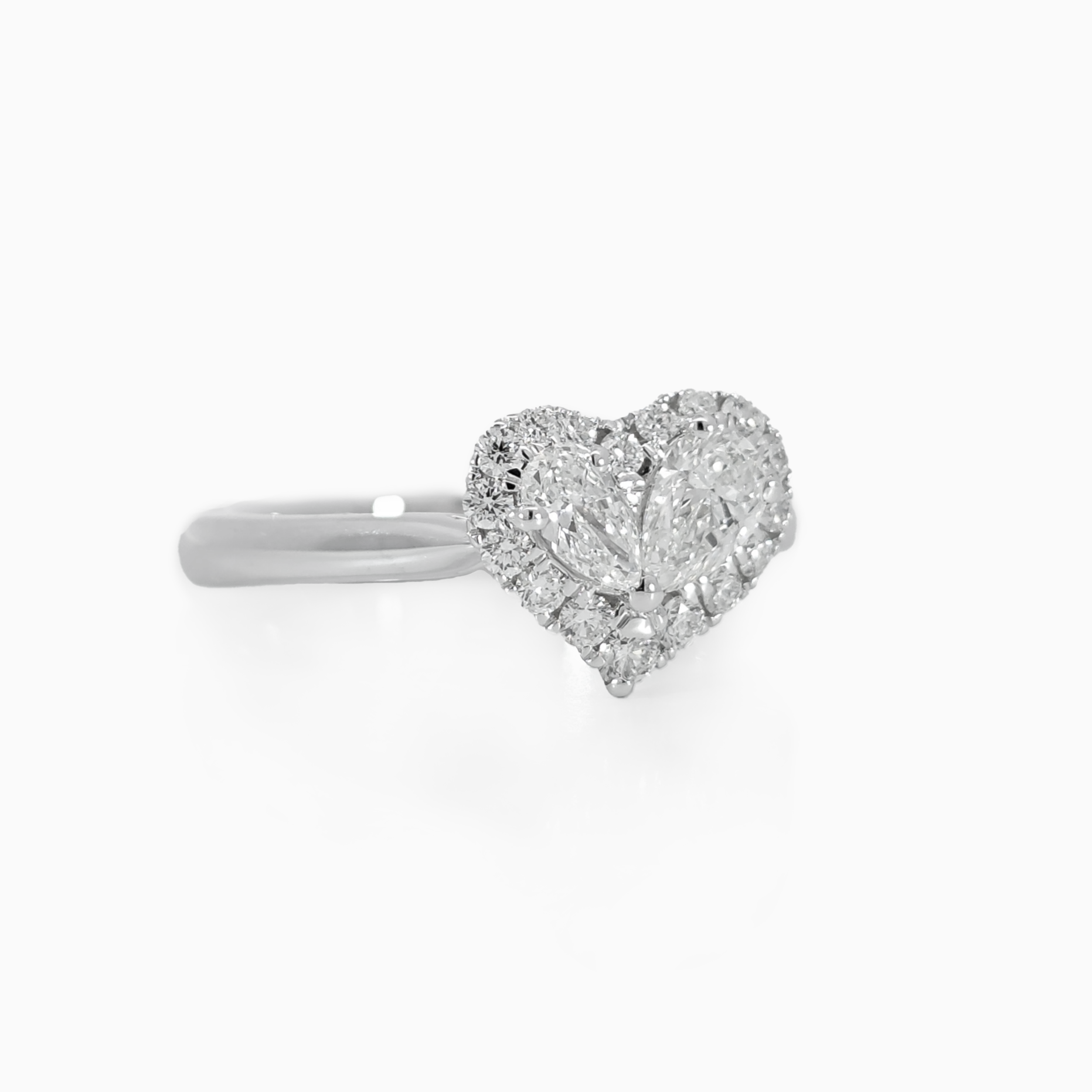Heart shaped pear diamond halo ring side view showing 0.30 carat pear diamond with heart halo setting 18K white gold
