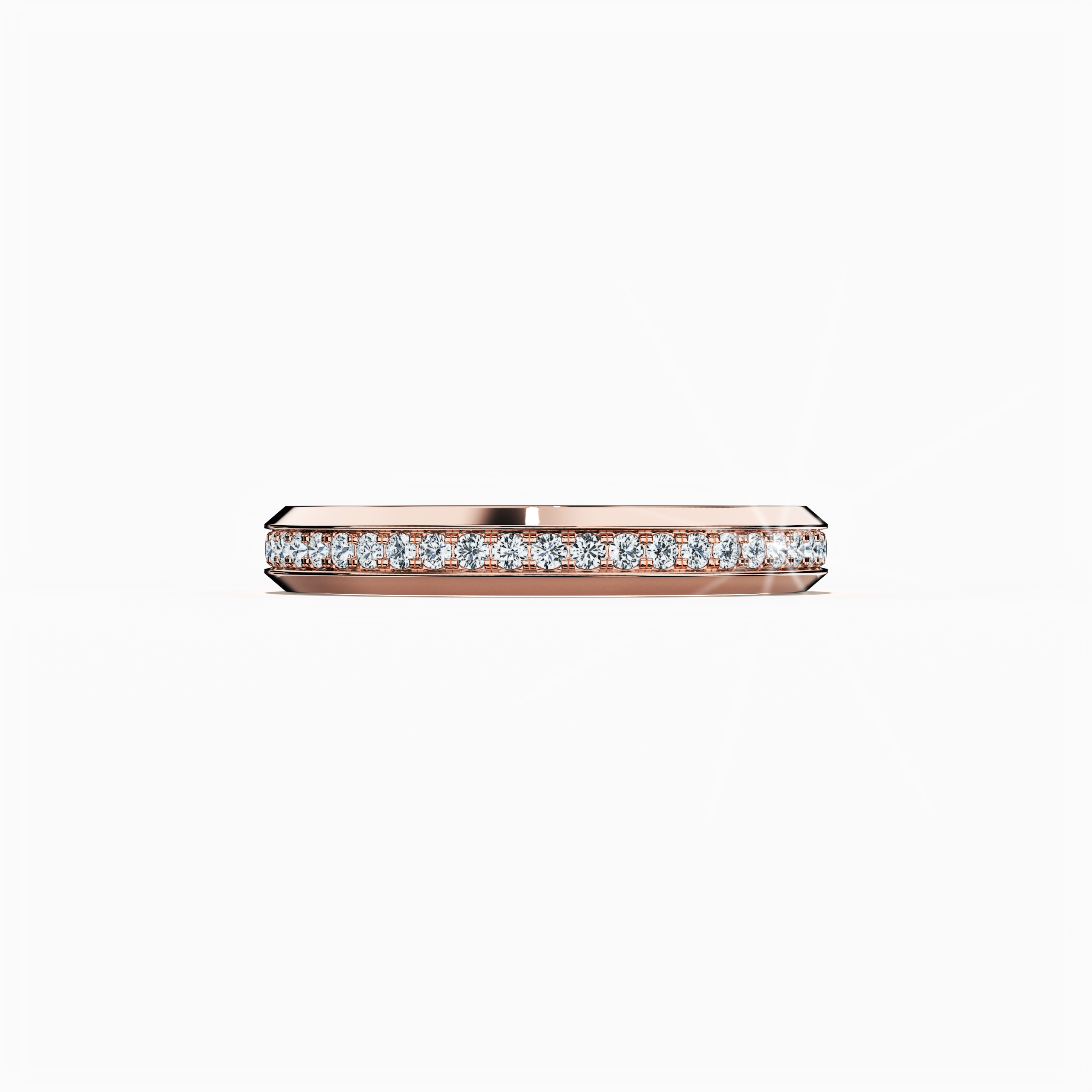 Image of a captivating rose gold paved band captured from a serene sleeping front view. This elegant ring presents a meticulously designed central section employing pavé, full pave, scattered pave, and cluster pave techniques. The warm rose gold, admired as “rosé gold” or “blush gold,” glows against a lustrous glossy finish, accentuating intricate detailing and refined craftsmanship. Keywords: sophisticated, luxurious, contemporary, graceful, exquisite design.