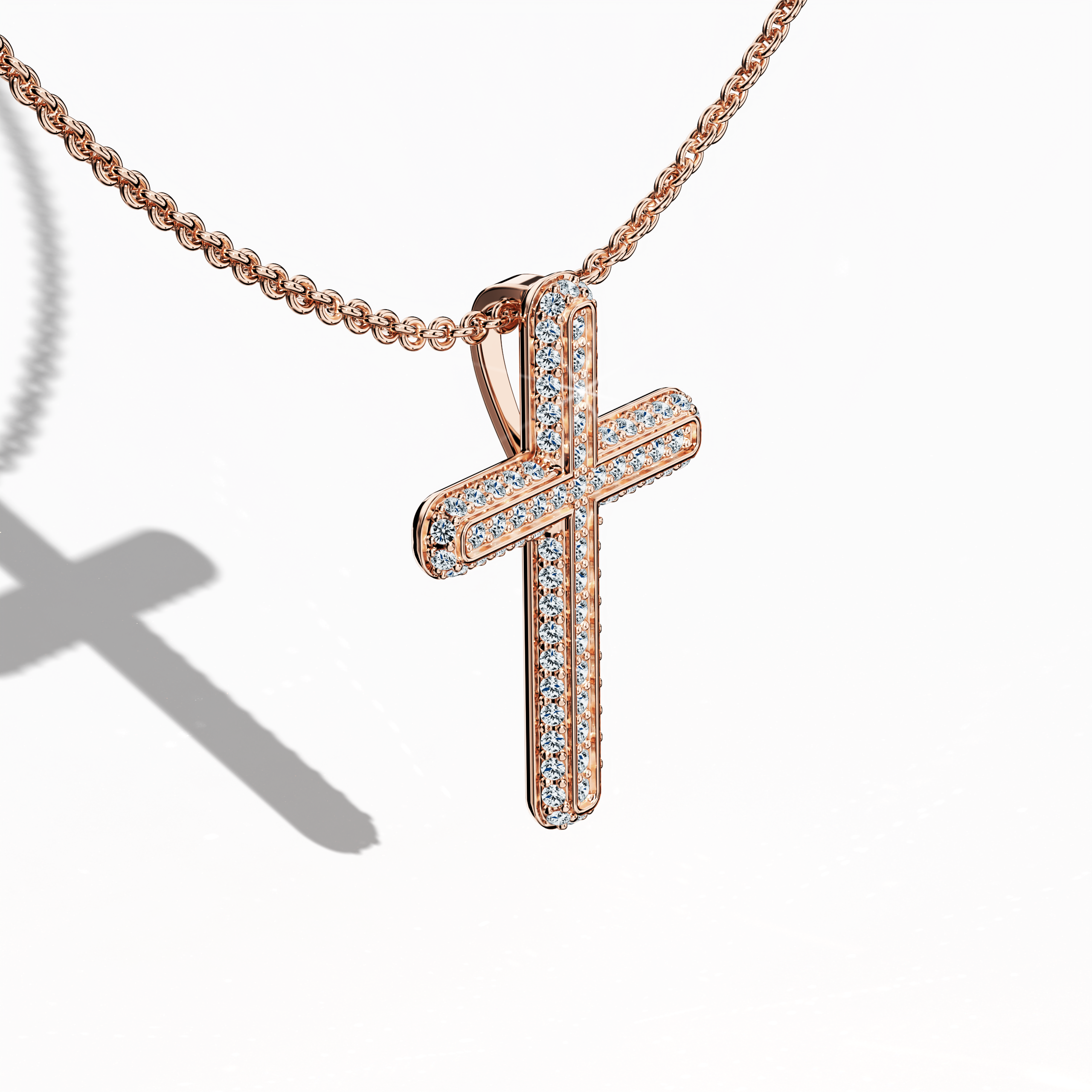 Front top side view of a paved cross pendant in radiant rose gold, often referred to as pink or blush gold across regions. Showcasing 0.40 carat of diamonds in a pavé arrangement, this piece highlights the cross’s subtle dimensions from an angled perspective. Its polished finish exudes warmth and sophistication.
Keywords: paved cross, rose gold, diamond setting, modern elegance.