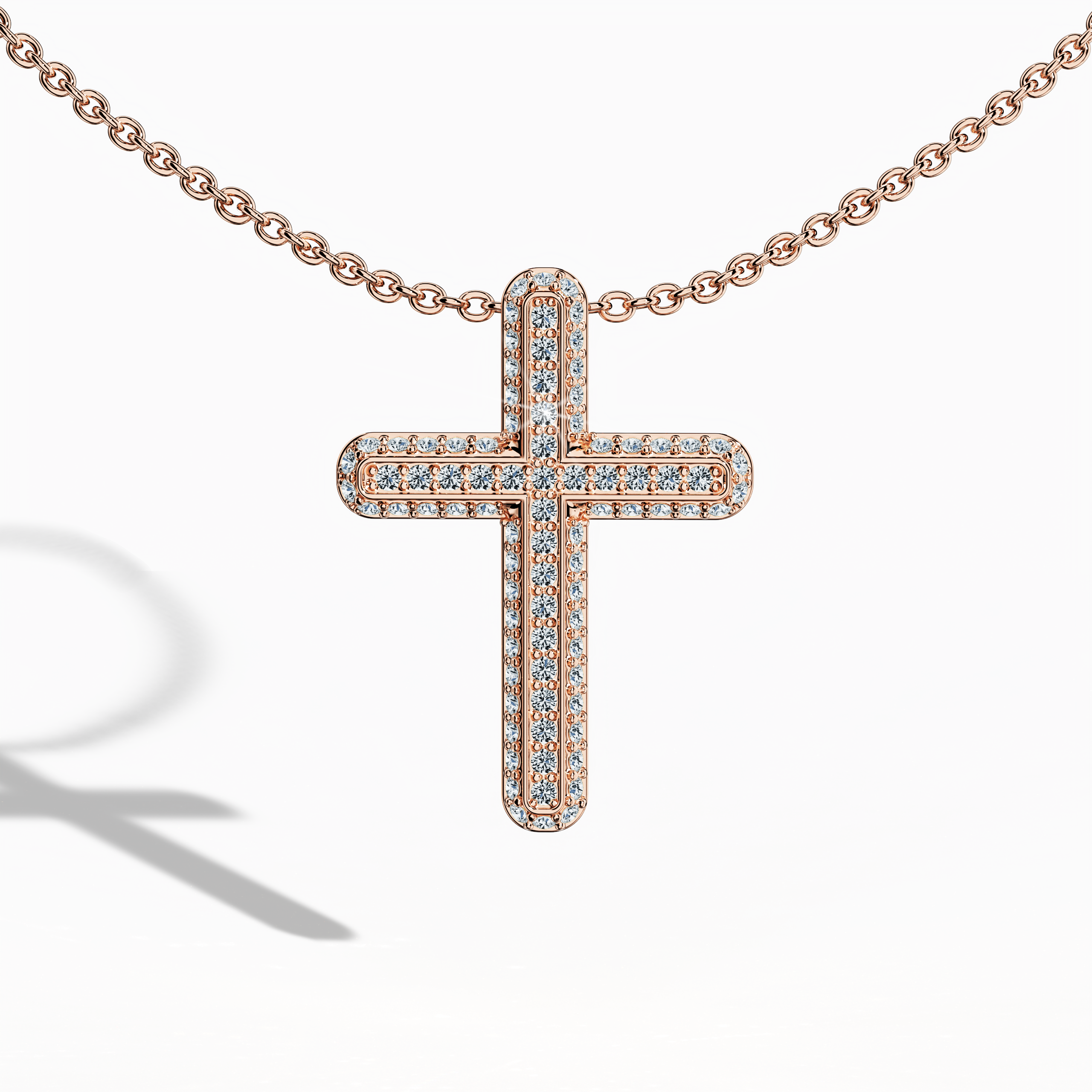 Front view of a paved cross pendant in warm rose gold, sometimes known as pink or blush gold in different locales. It features 0.40 carat of diamonds in a pavé setting, also described as a gem-studded cross or diamond cross. The softly glowing metal complements the sparkle, blending tradition with modern chic.
Keywords: paved cross, rose gold, 0.40 carat diamond, refined style.
