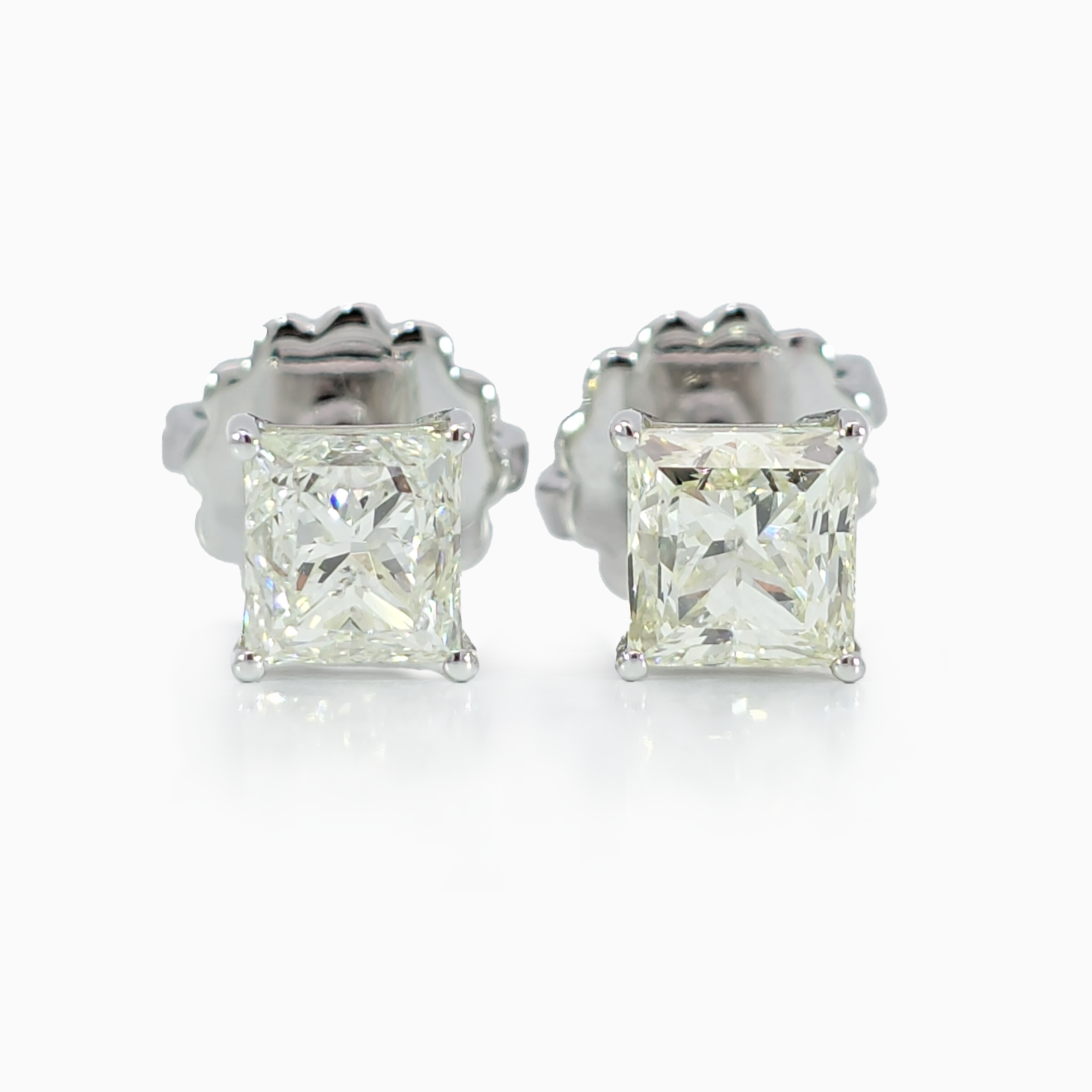 Solitaire Princess Earring 2.00 carat total natural diamond I-K color SI clarity 18K white gold handcrafted in Dubai
