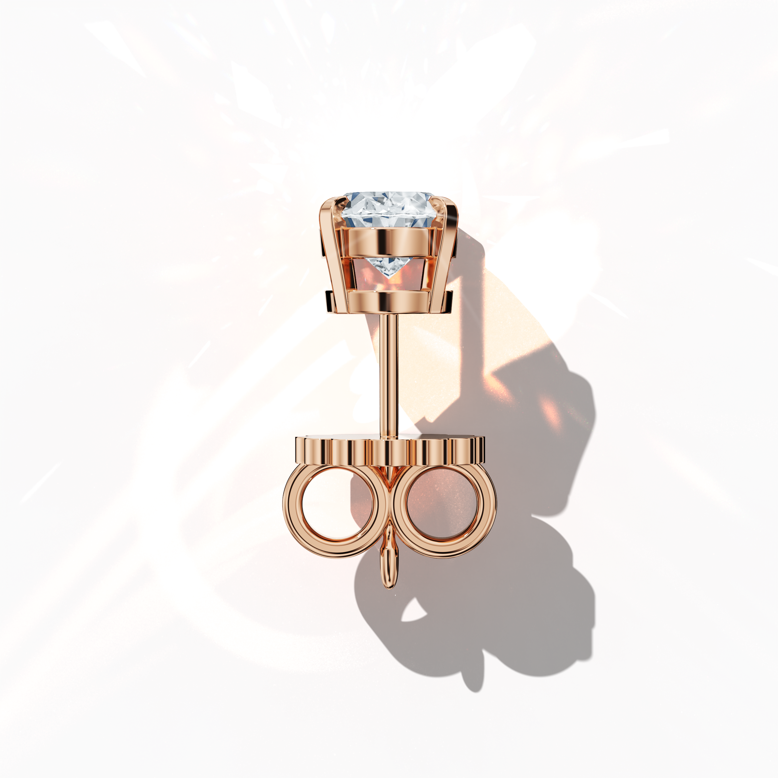 Top view of 1-carat natural diamond earring in 18k rose gold with nail prong setting; features an oval cut diamond (also known as oval brilliant or elongated oval in some regions) – luxury fine jewelry/fine jewellery ear accessory.