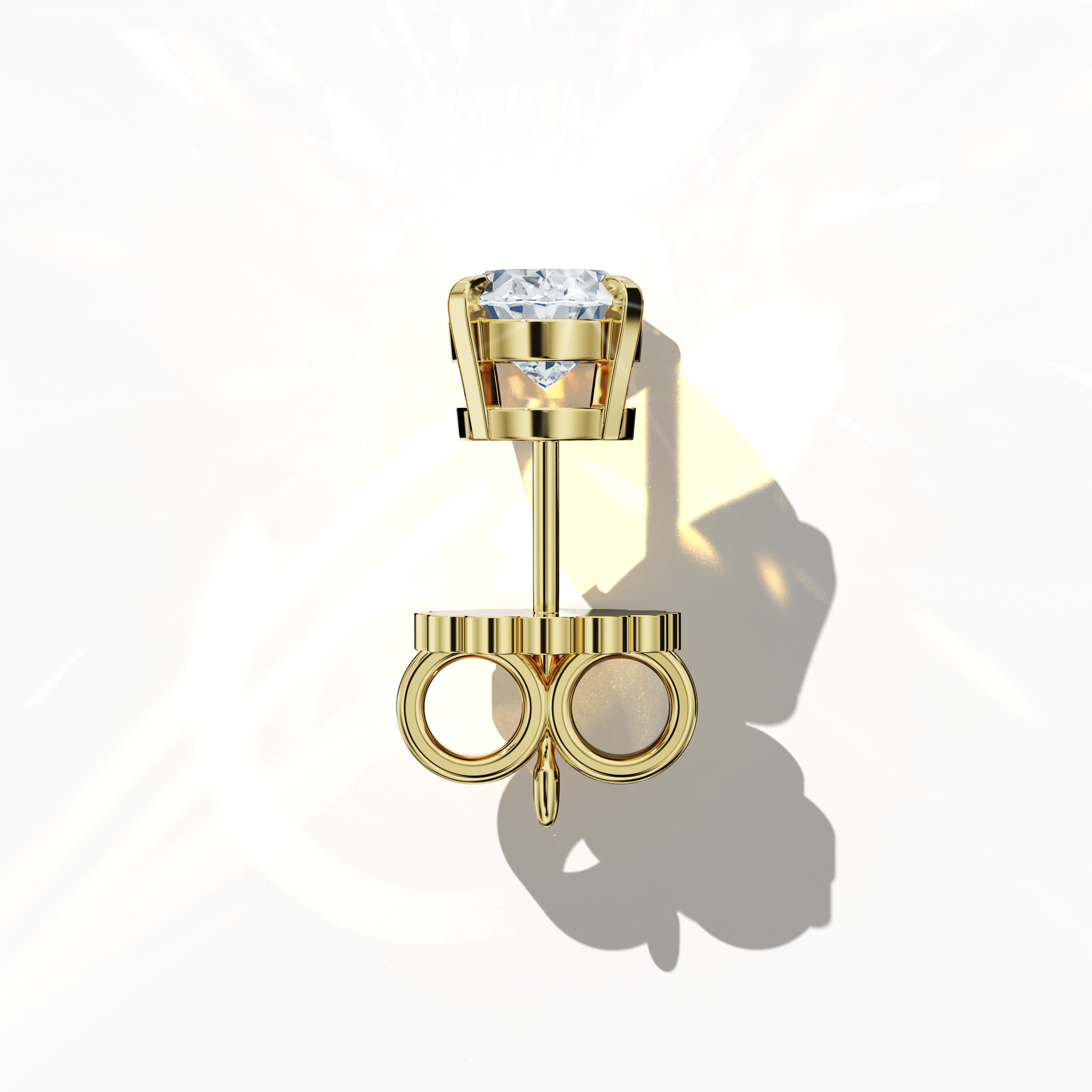 Top view of 1-carat natural diamond earring in 18k yellow gold with nail prong setting; features an oval cut diamond (also known as oval brilliant or elongated oval in some regions) – luxury fine jewelry/fine jewellery ear accessory.