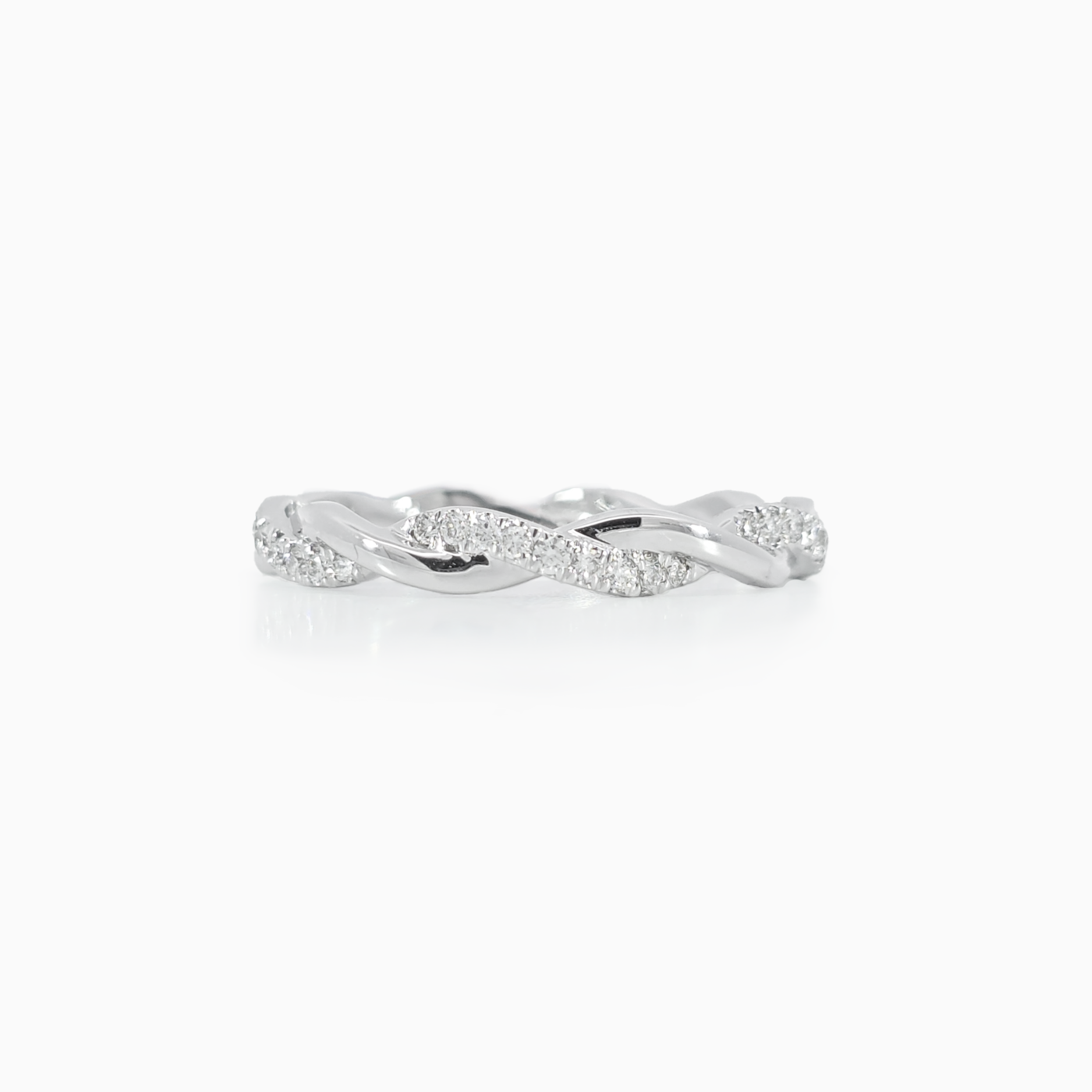 Twisted diamond rope band 0.15 carat total diamond D-F color VVS-VS clarity 18K white gold handcrafted in Dubai
