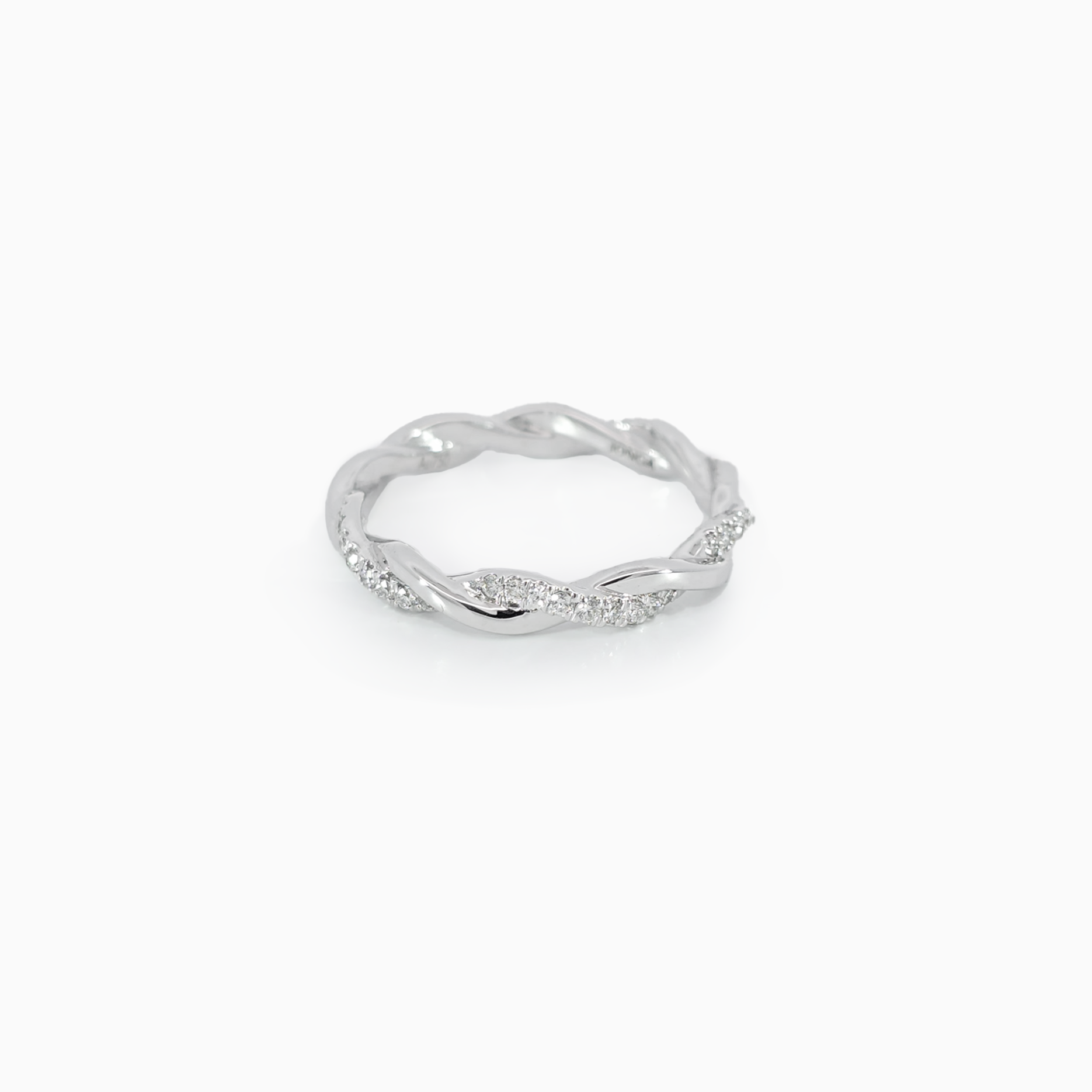 Twisted diamond rope band side view showing 0.15 carat D-F color VVS-VS clarity diamonds in twisted rope design 18K white gold
