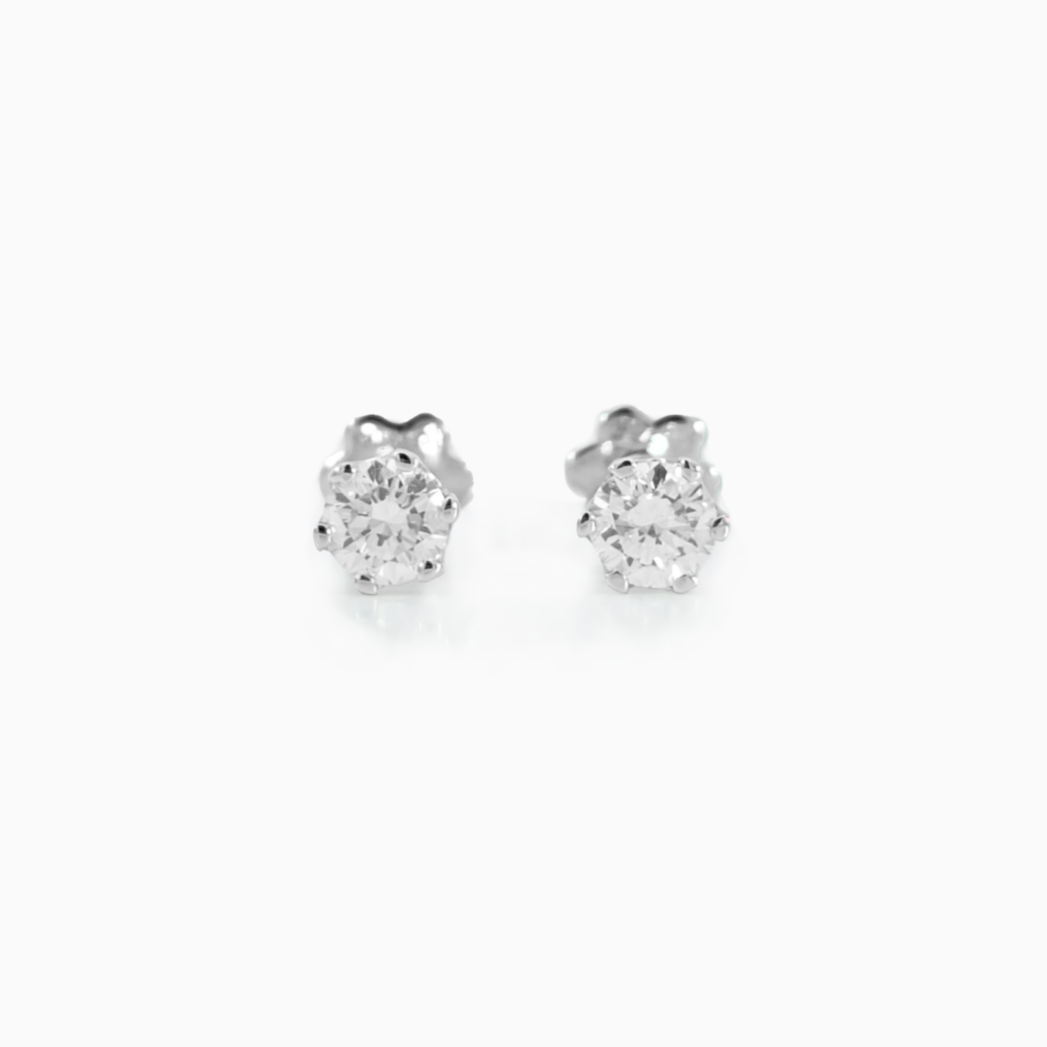 Classic Studs Big Size 0.34 carat total diamond D-F color VS clarity 18K white gold handcrafted in Dubai
