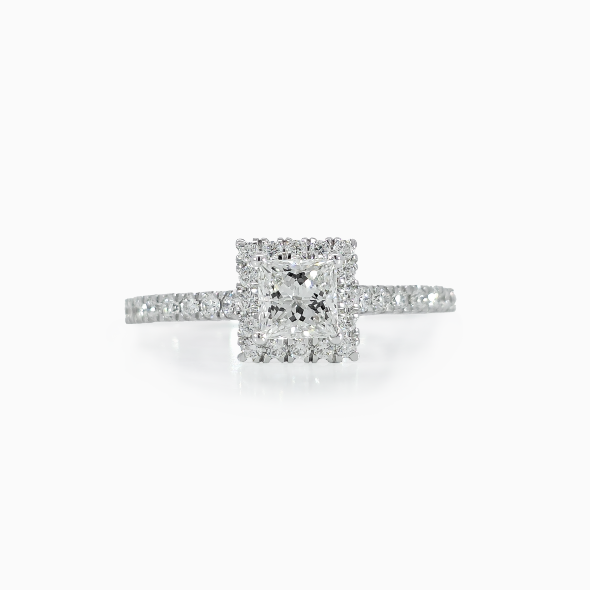 Halo Princess Ring 0.84 carat total weight 50ct center diamond GIA certified G color VVS clarity 18K white gold handcrafted in Dubai
