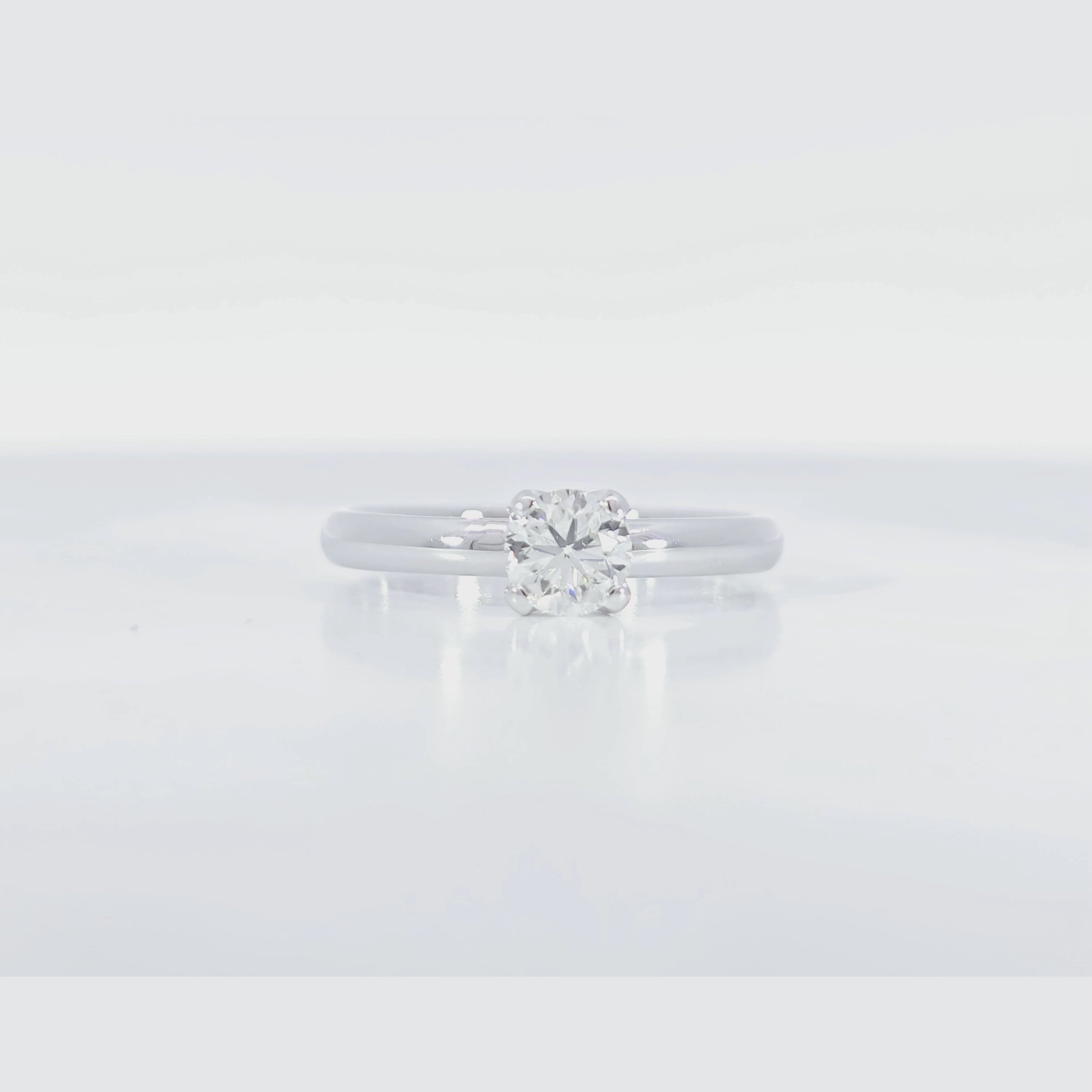 Classic Solitaire Ring 45 degree video displaying 0.50 carat F color diamond and polished white gold craftsmanship
