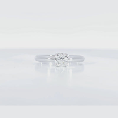 Classic Solitaire Ring 45 degree video displaying 0.50 carat F color diamond and polished white gold craftsmanship
