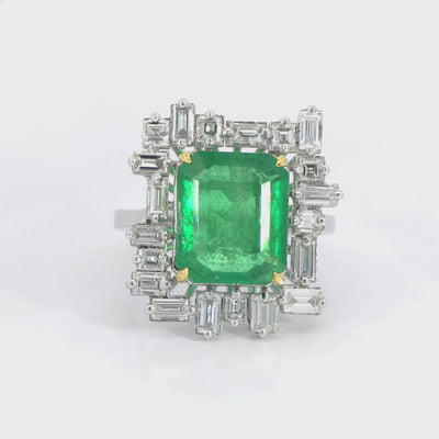 Green Emerald with tapered baguette halo ring video 6.32 carat IGI certified emerald 1.67 carat D-F color VVS clarity diamonds white gold craftsmanship
