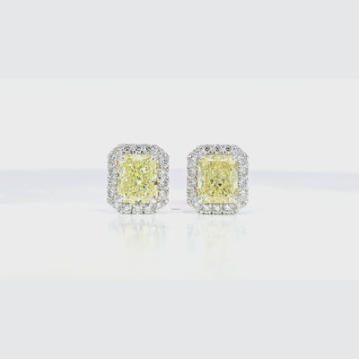 Yellow Radiant Diamond Halo Earring 45 degree video showcasing 3.01 carat Y-Z color center diamond
