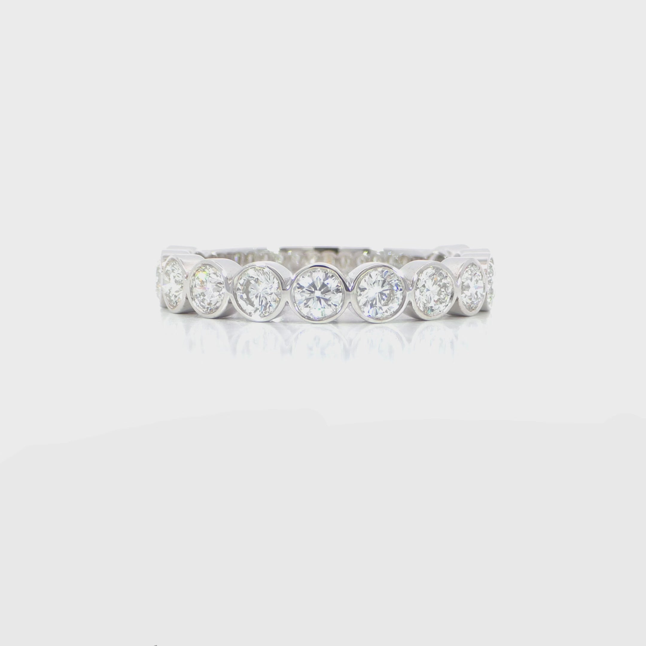 Bezel Band video displaying 1.30 carat total D-F color VS clarity diamonds and white gold craftsmanship
